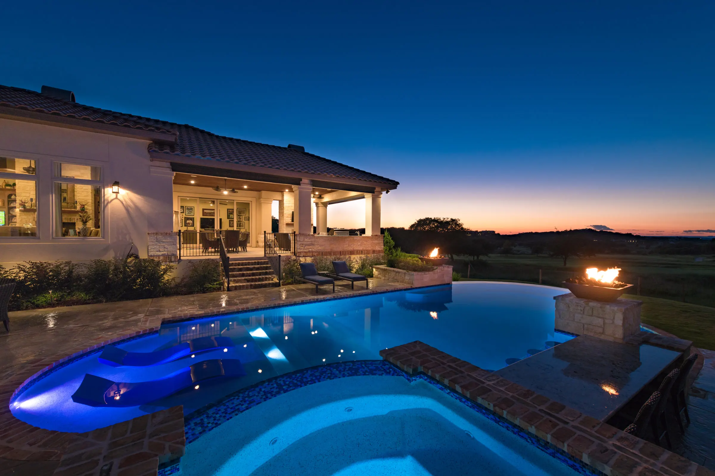Hilltop resort pool at dusk in Boerne, Texas